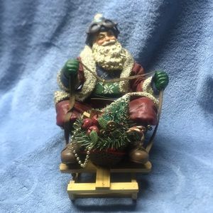 Sledding Santa Claus by Clothtique Santa’s by Possible Dreams, 8 inches tall